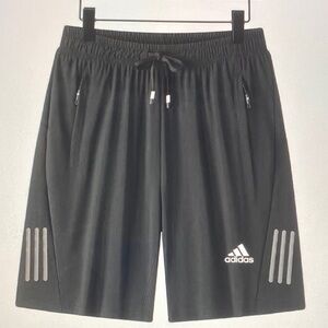 adidas Men’s Black Athletic Shorts with Reflective Accents